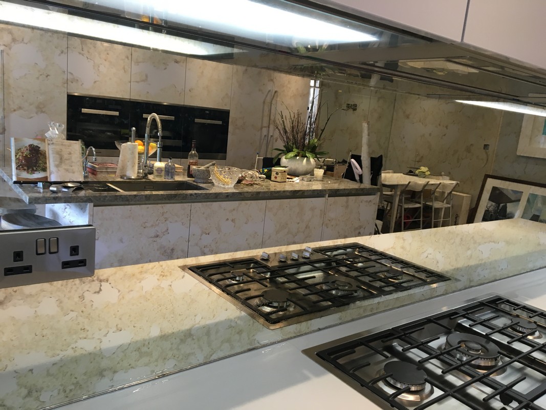 Mirror glass splashback in Olney luxury kitchen